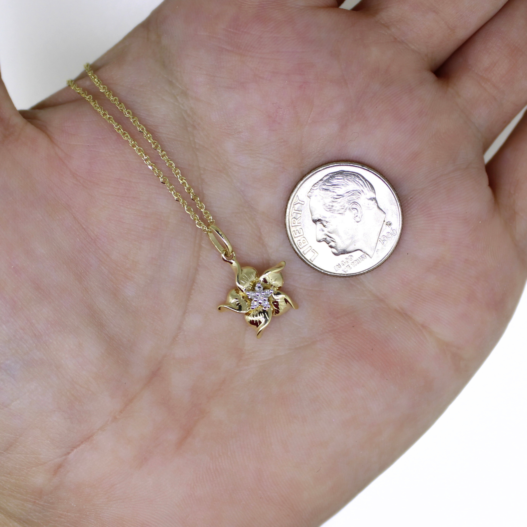 Brianne & Co. diamond flower necklace smaller than a dime
