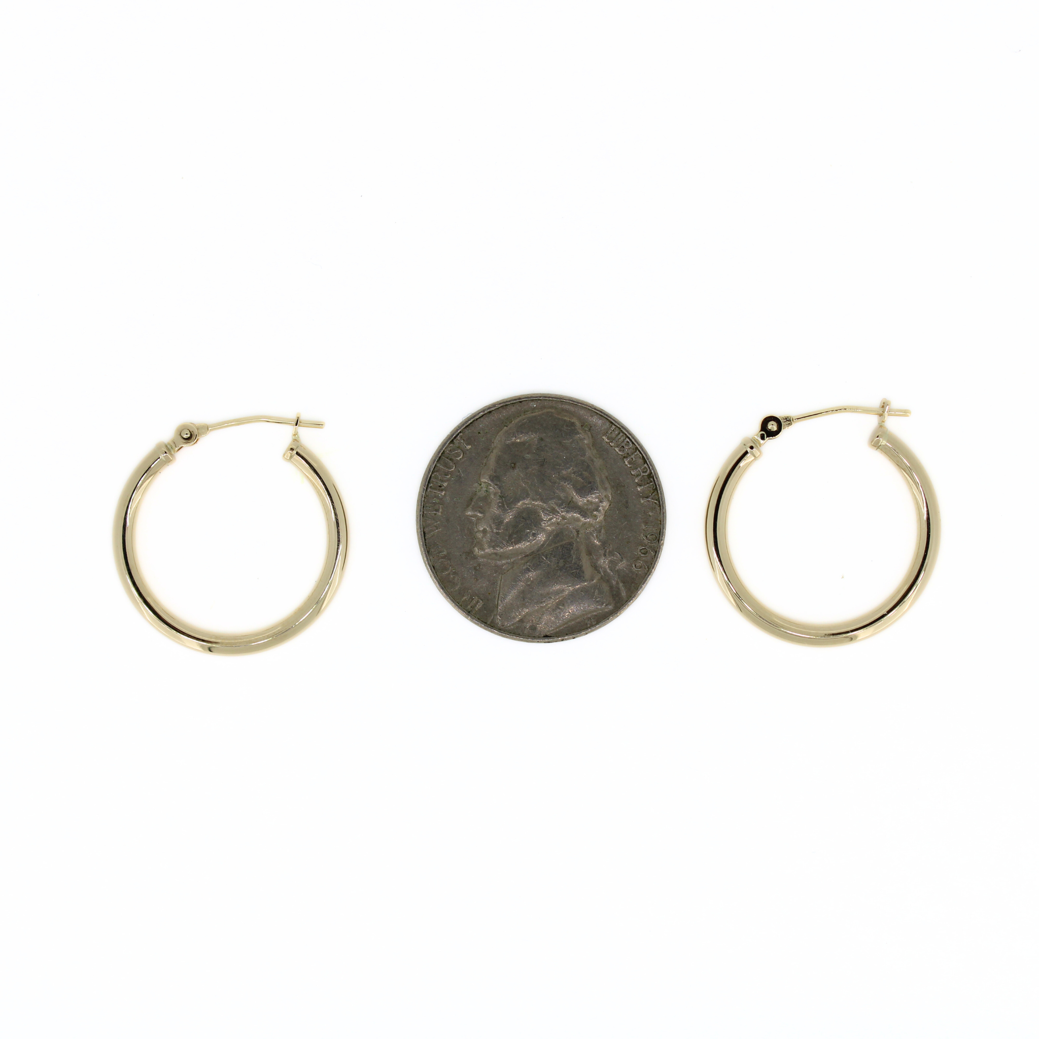 14k gold 20mm hoop earrings compared to a nickel