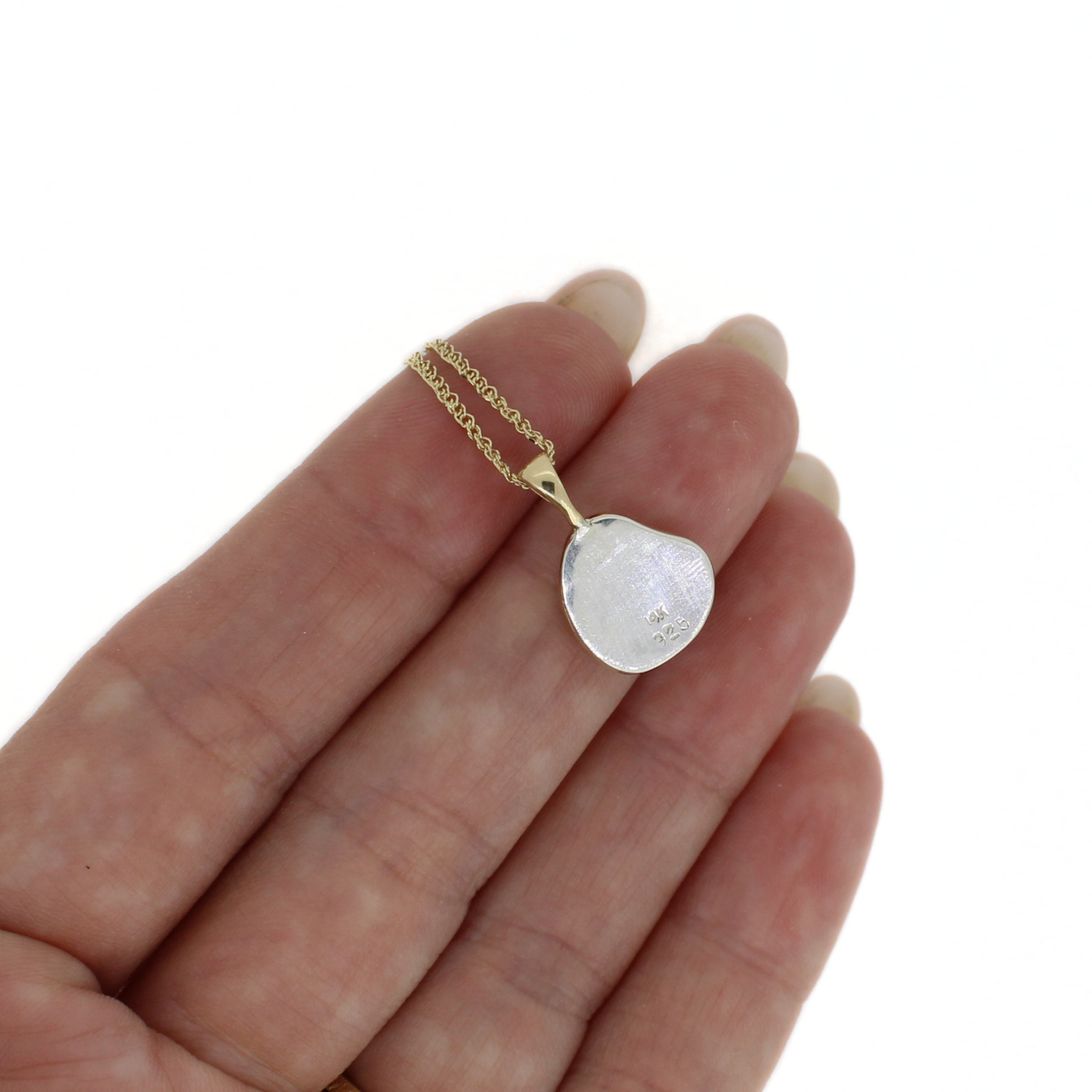 Gold keshi pearl pendant necklace with silver-luster teardrop pearl on gold chain
