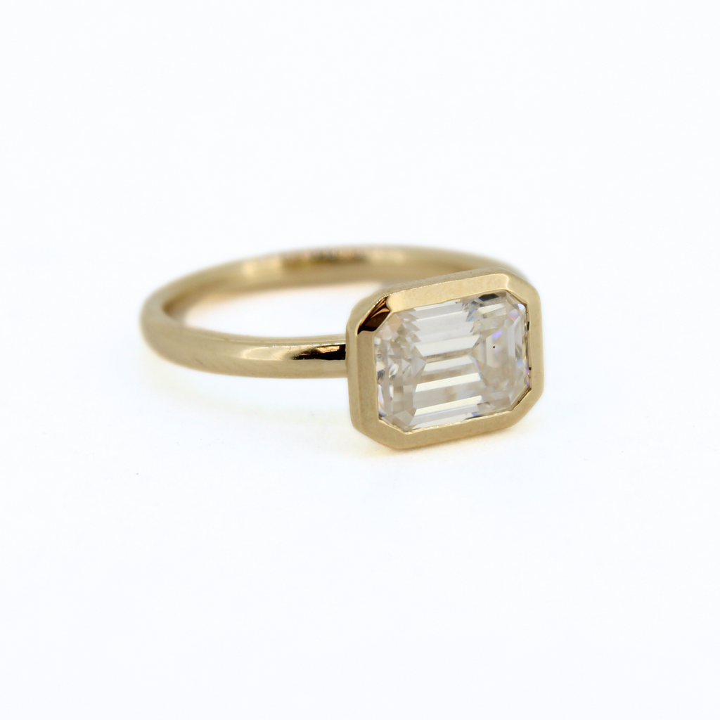 Brianne & Co. emerald cut moissanite ring in 14k gold