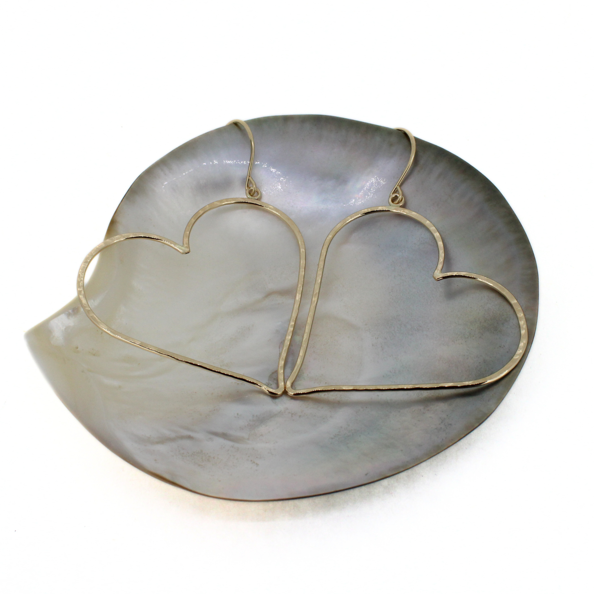 Brianne & Co. 14k gold fill heart shaped hoop earrings with a hammered texture