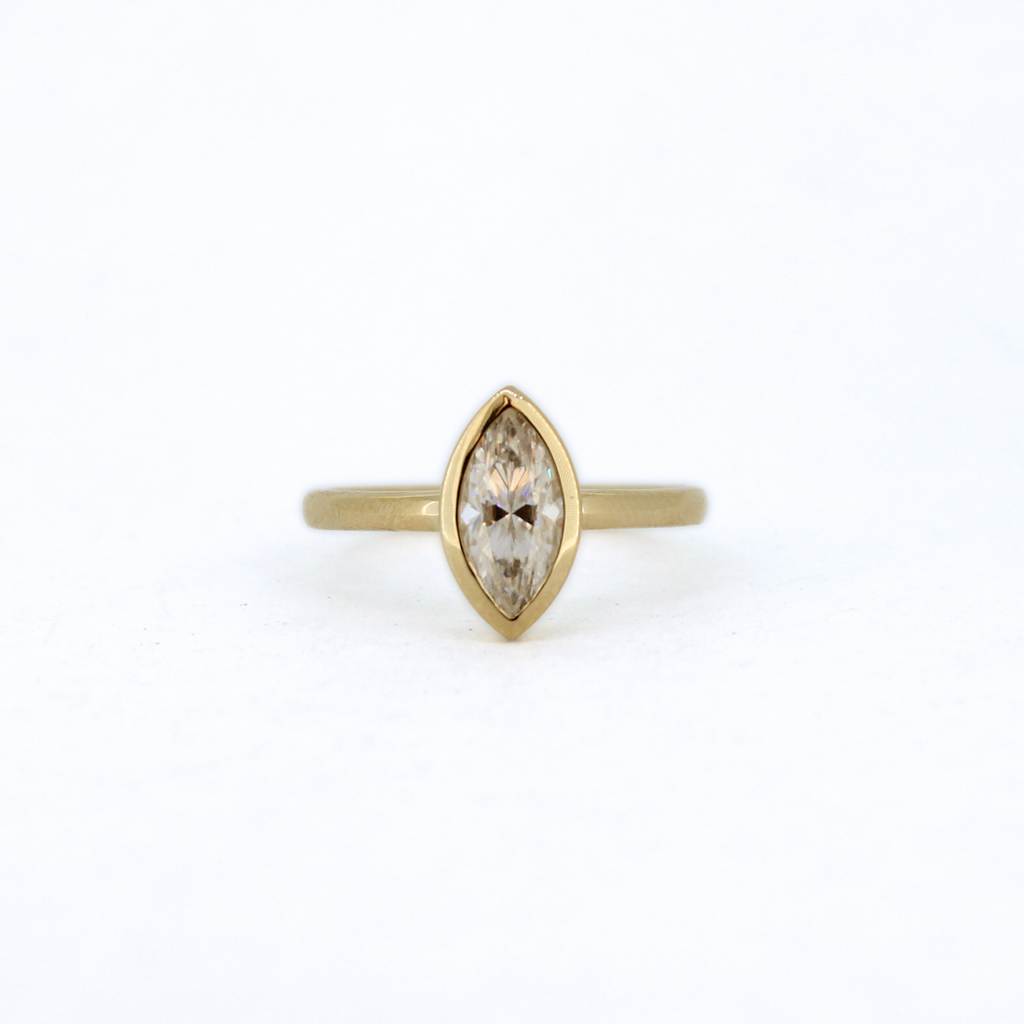 Brianne & Co. 14k gold marquise cut moissanite ring