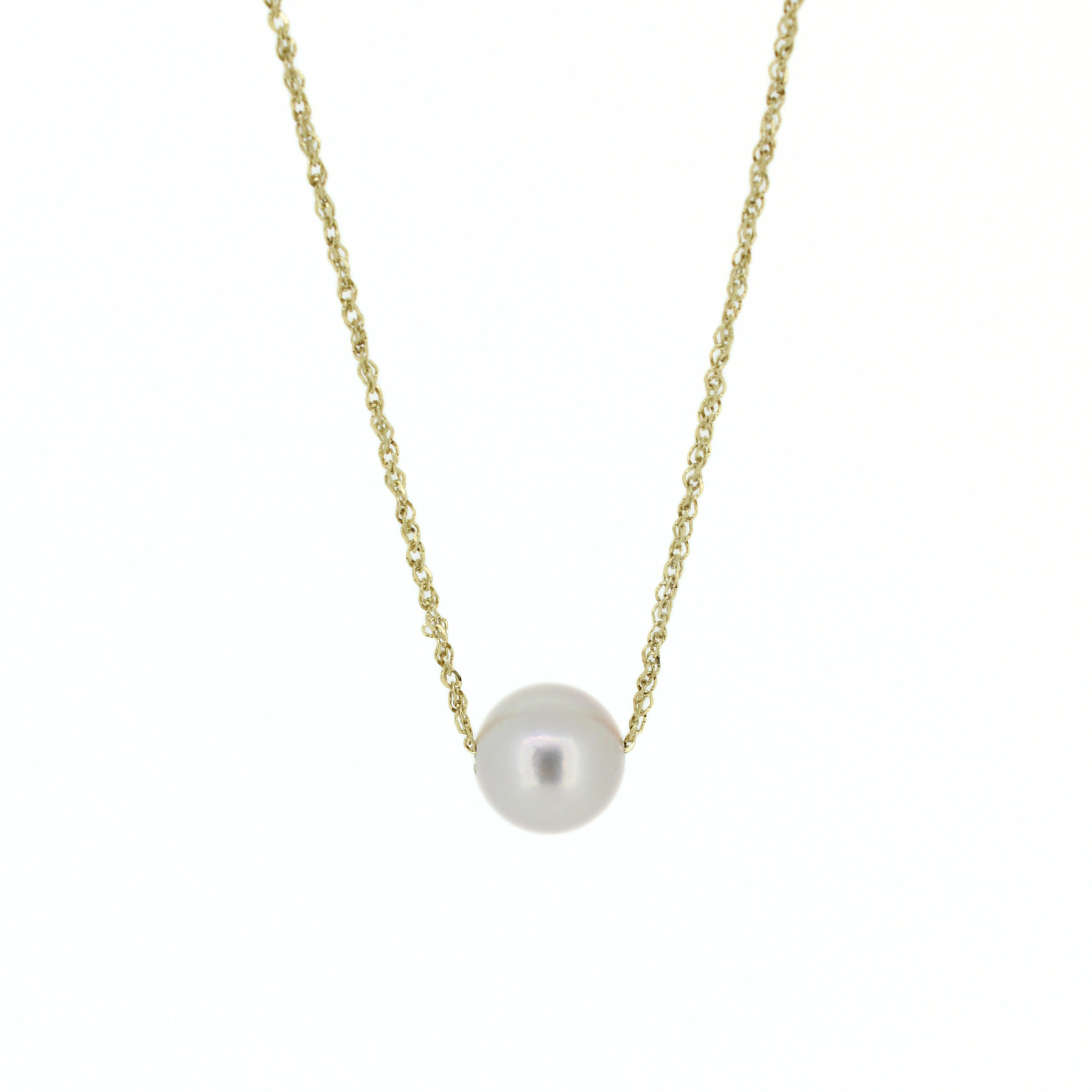 A delicate gold chain necklace featuring a single white akoya pearl pendant, shown against a plain white background. Handmade by Brianne & Co.