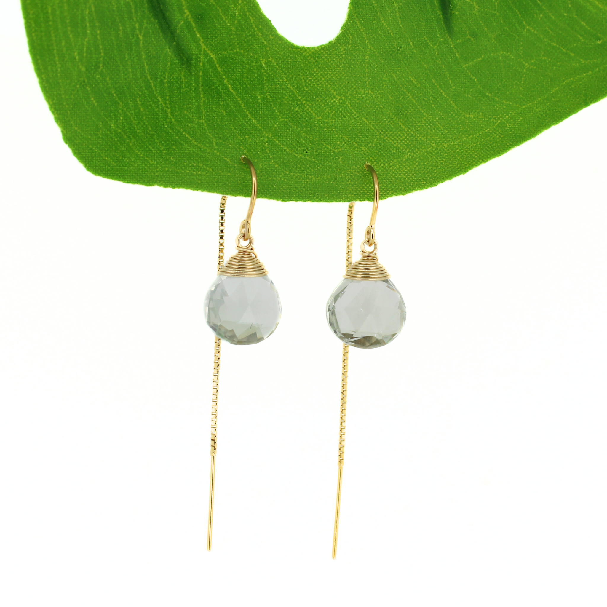 Brianne & Co. 14k gold filled threader style earrings with faceted light green amethyst gemstones