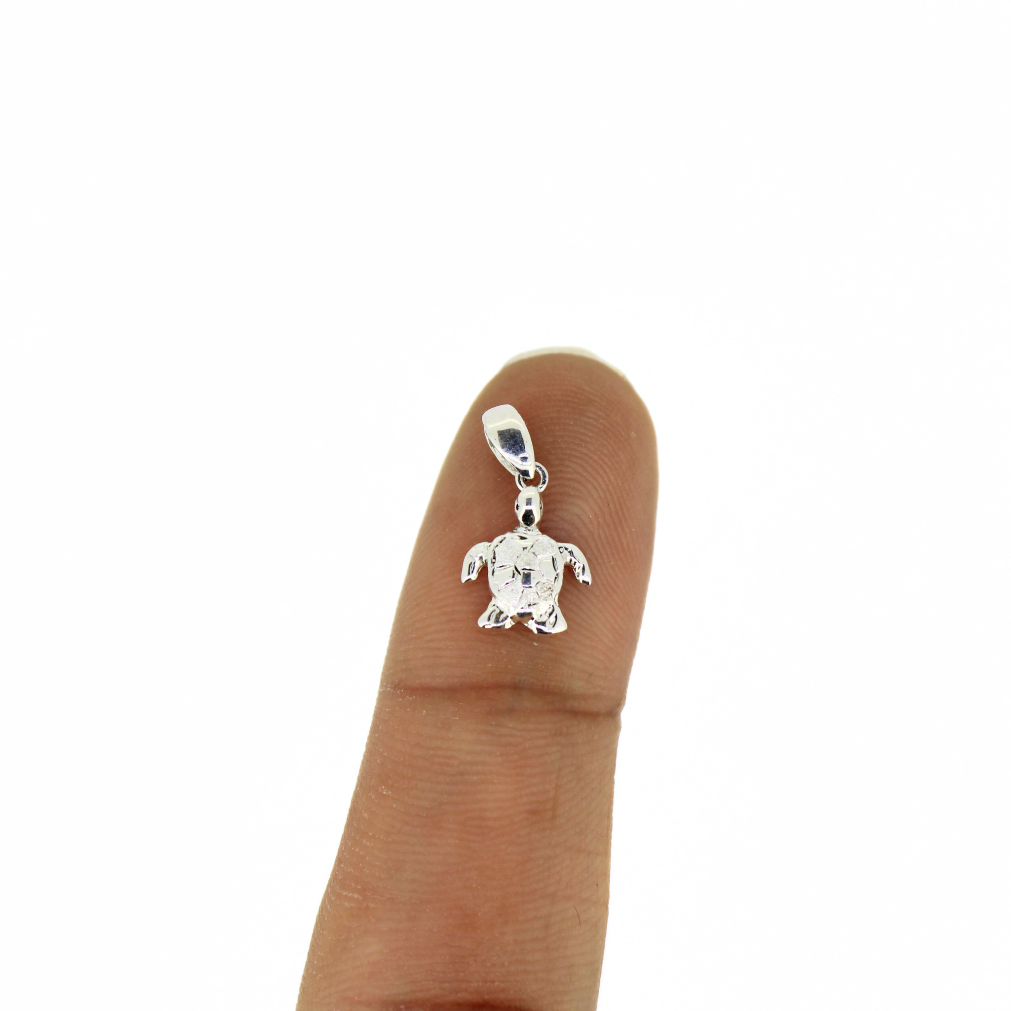 Brianne and Co. Sterling Silver Honu Pendant on Finger