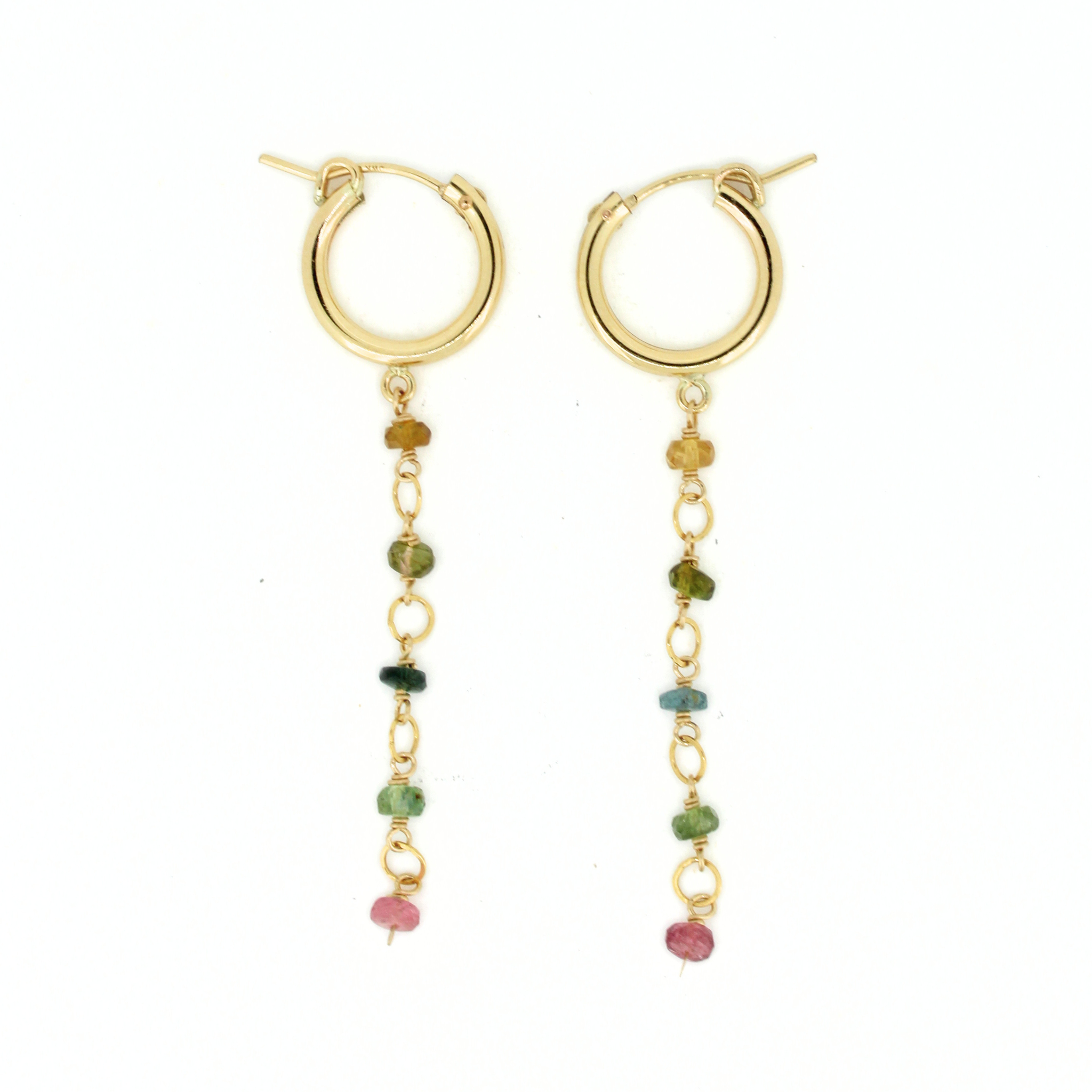 A pair of gold hoop dangle earrings with small multicolored tourmaline gemstone beads on a white background. Handmade in Kauai, Hawaii by Brianne & Co.