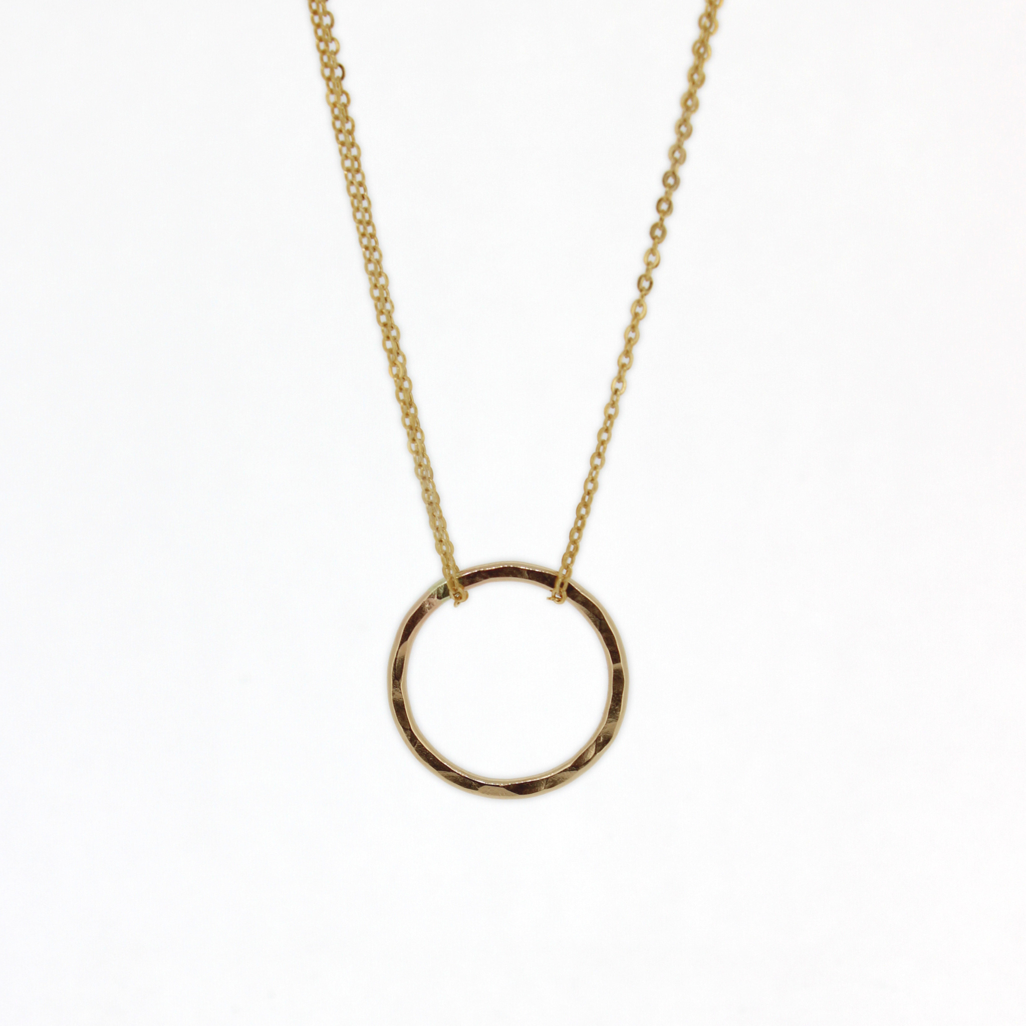 Brianne & Co. yellow gold fill circle pendant necklace with a hammered texture