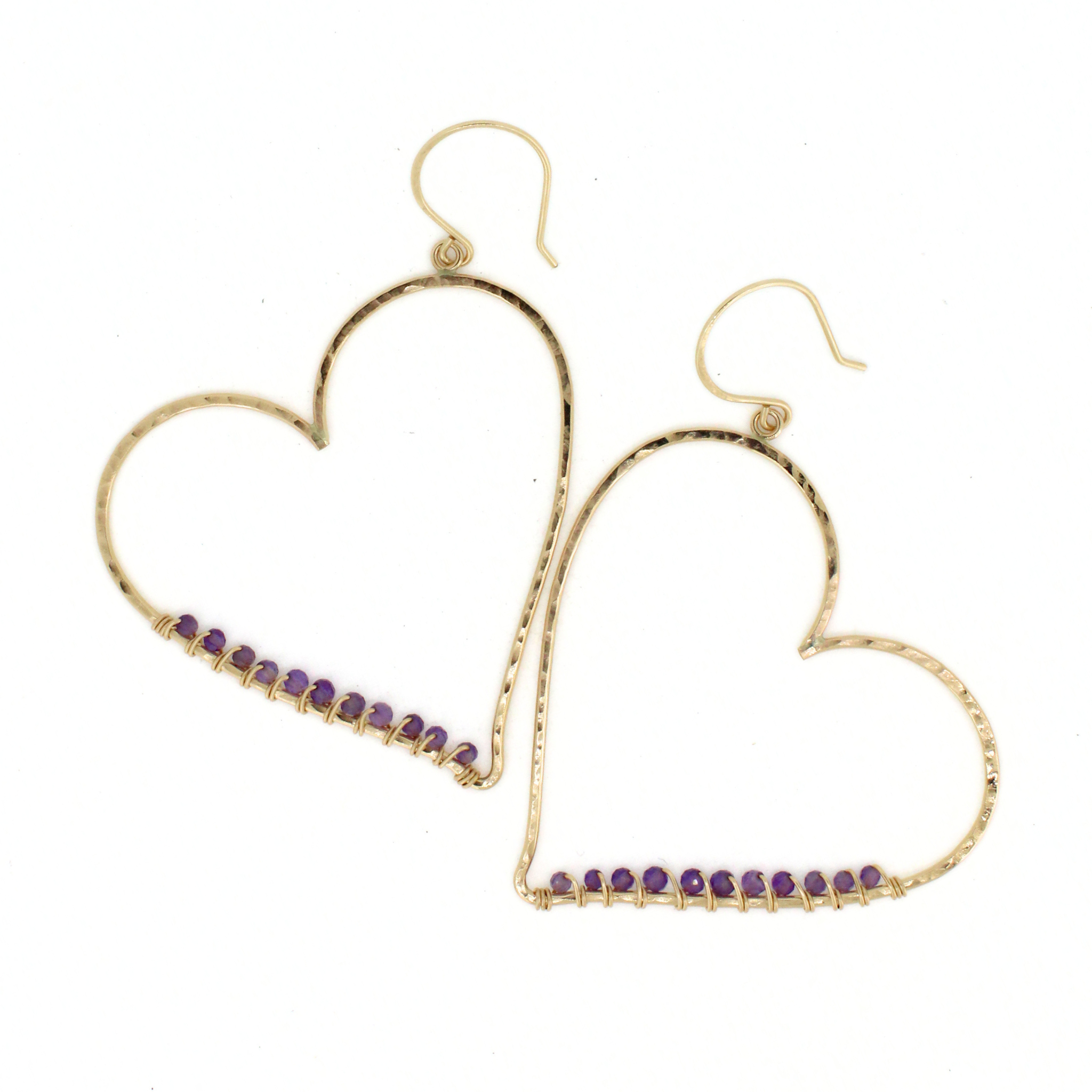 Brianne & Co. 14k gold filled heart shaped hoop earrings with tiny purple amethyst gemstones