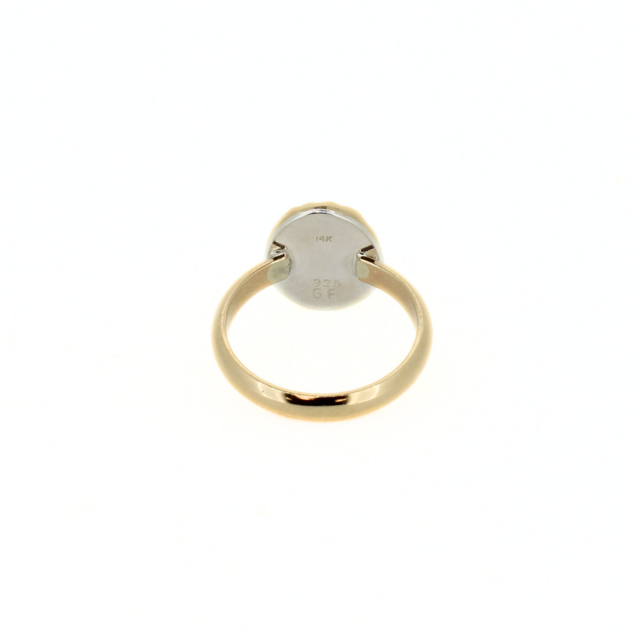 Gold tone opihi shell ring with stamped interior band, back view