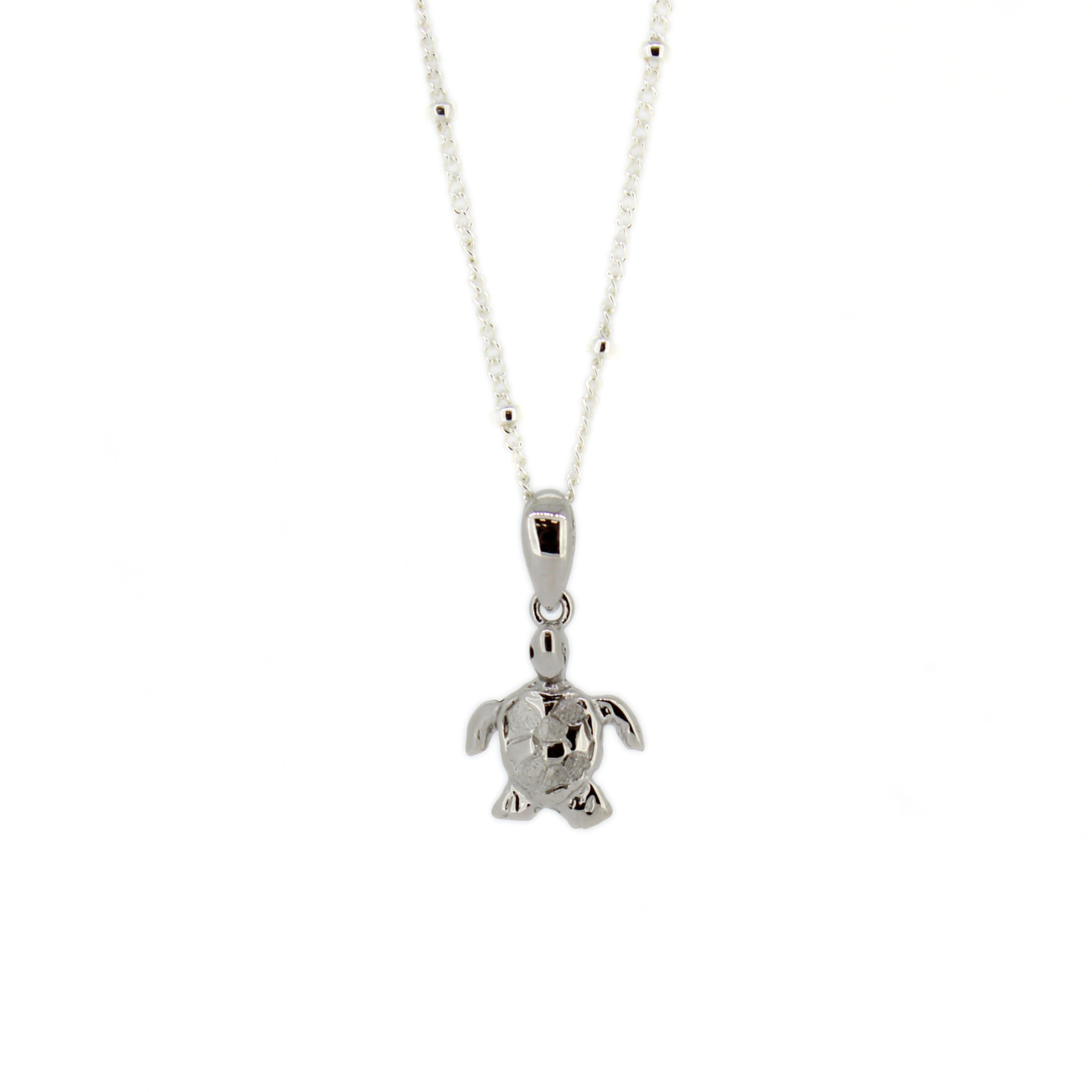 Brianne & Co. tiny silver honu turtle pendant on a satellite chain