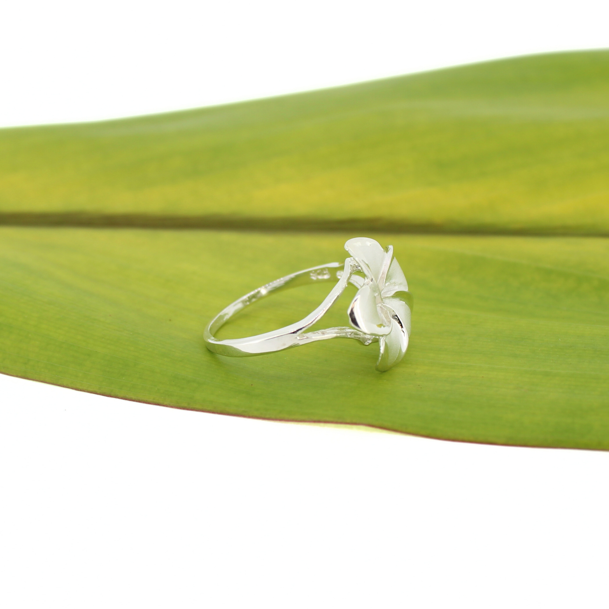 Brianne and Co. Side view of sterling silver plumeria ring