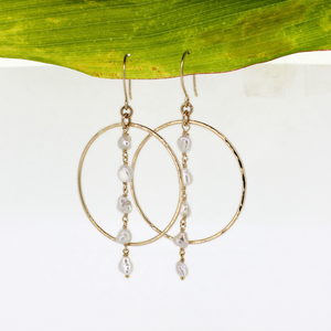 Brianne & Co. white Edison keshi pearls hang from our popular gold fill hammered hoops