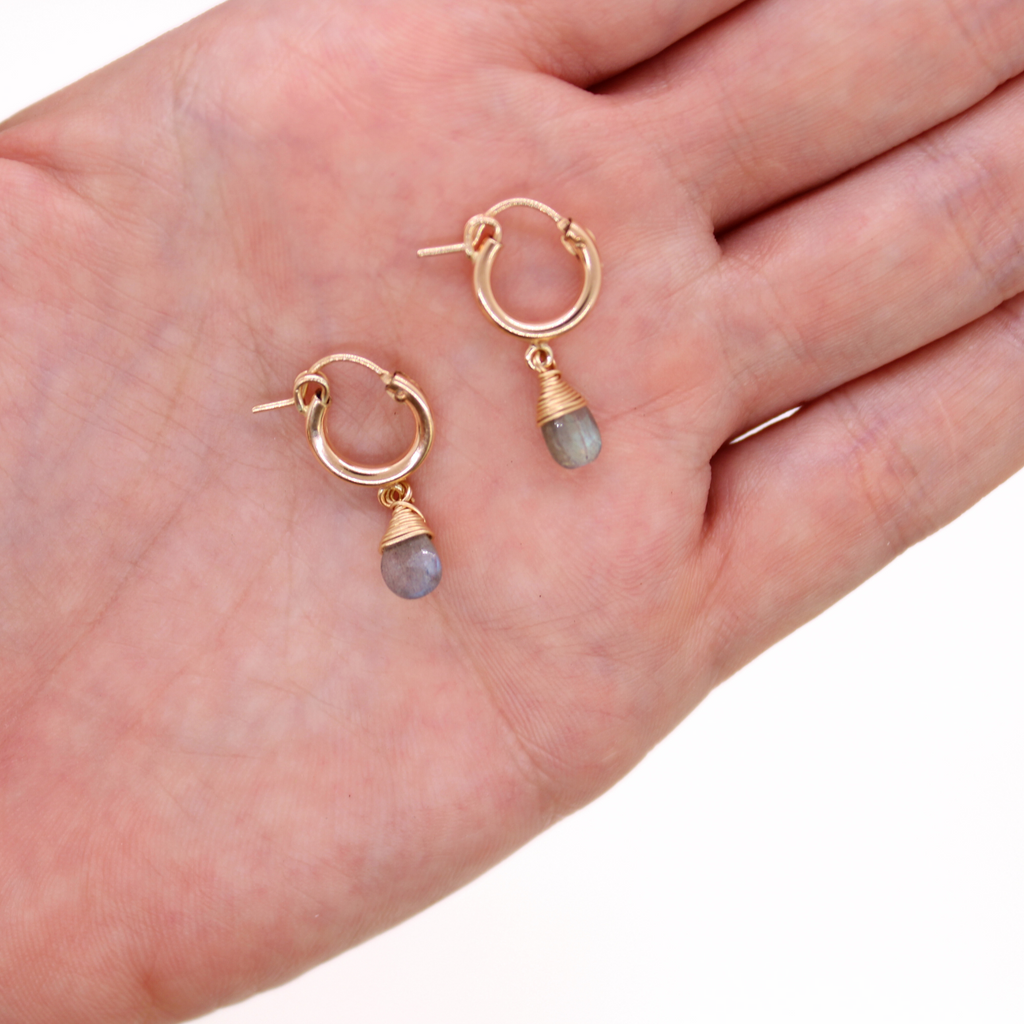 Brianne & Co gold fill hoops with wire wrapped labradorite shown in hand