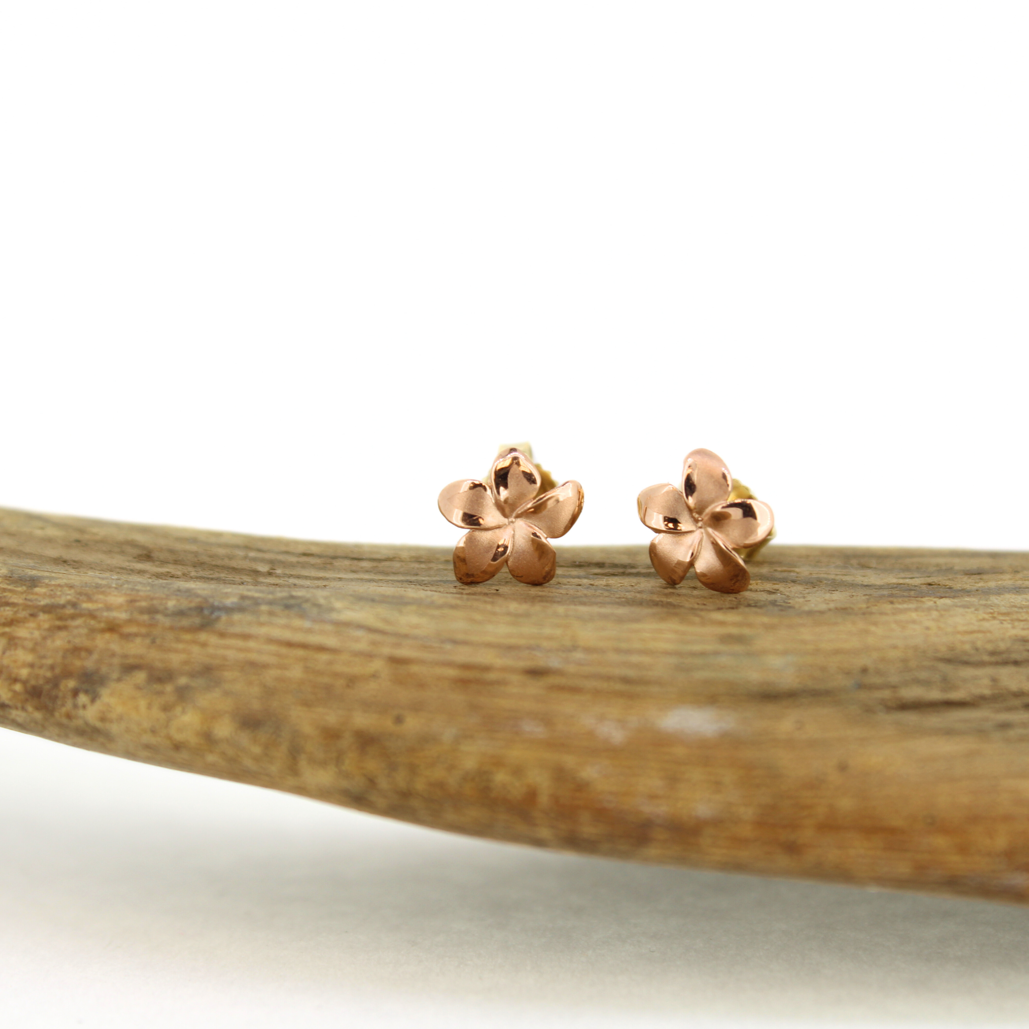 Brianne and Company plumeria flower earrings with matte finish on petals and shiny around edges