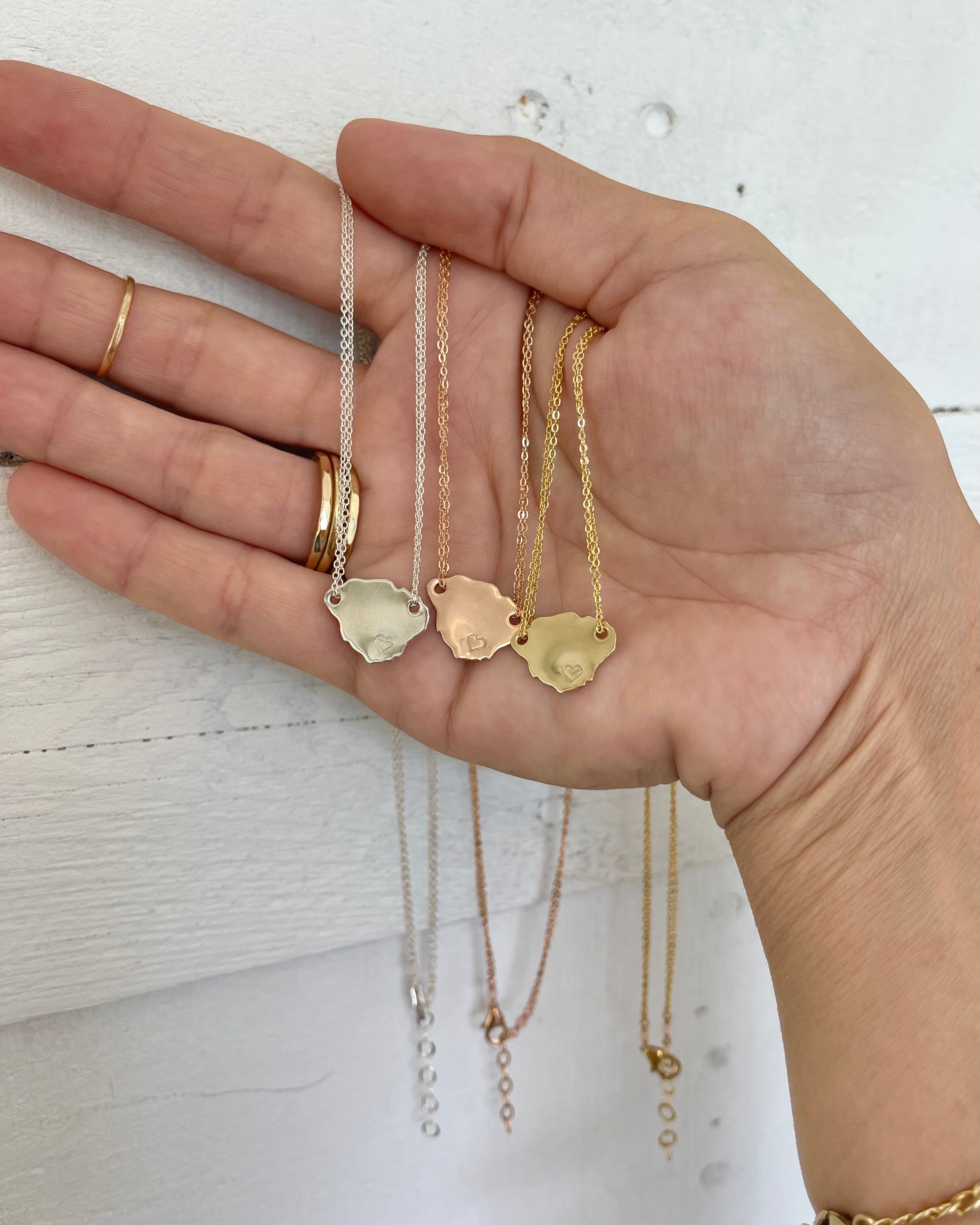 Kauai Island pendant on double chain with optional heart stamp on pendant. Necklace is available in sterling silver, and rose or yellow gold filled
