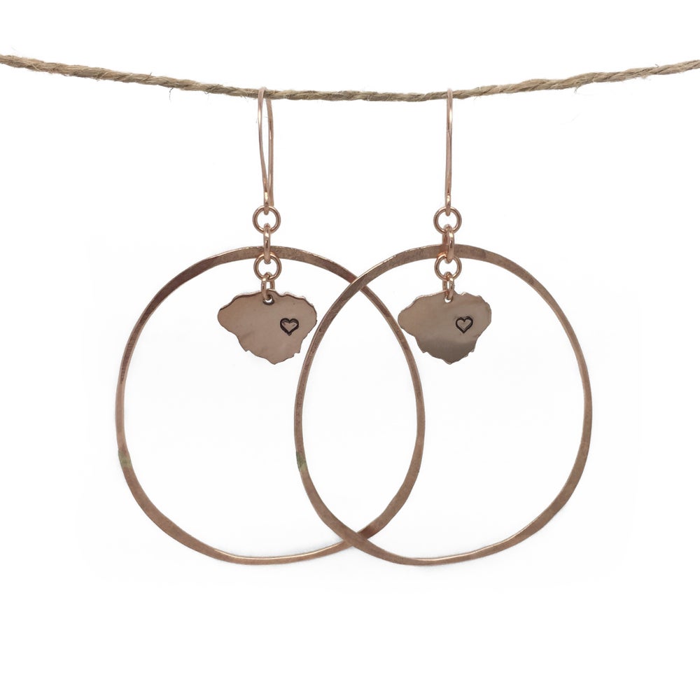 lightweight organic hammered hoops with Kauai love charm made by hand