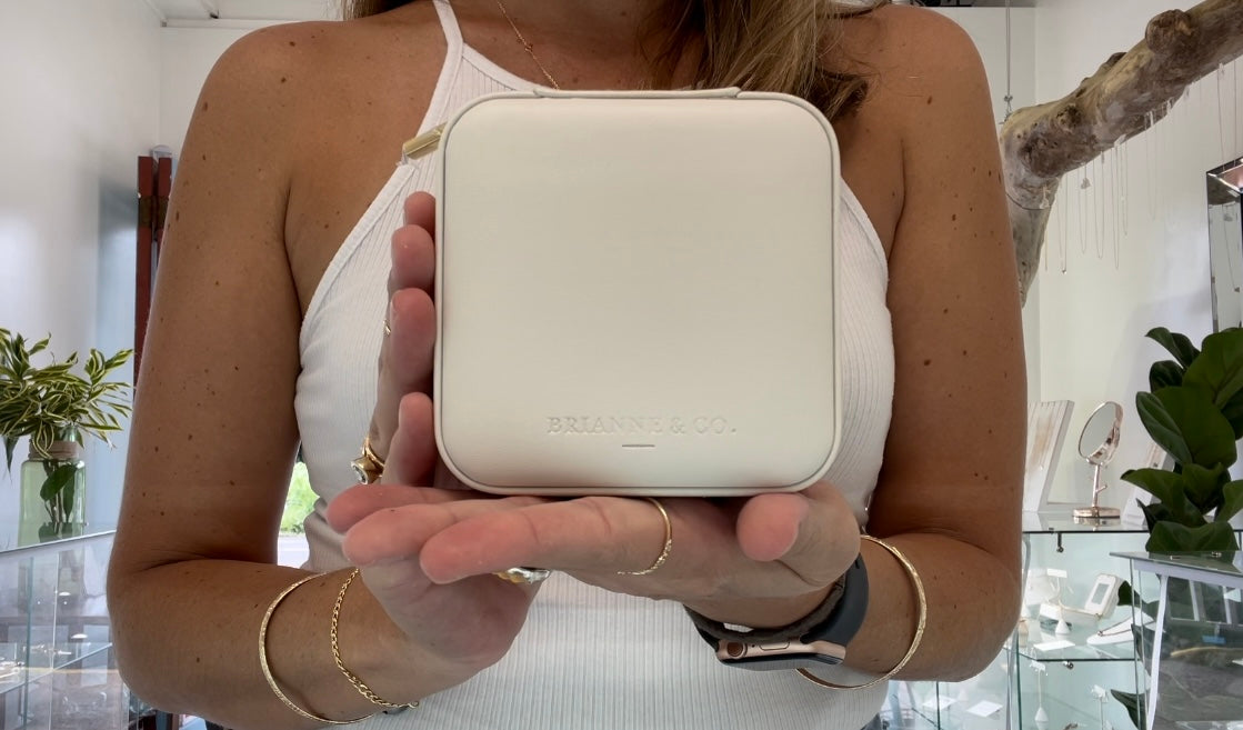 brianne and co branded leather jewelry travel case shown by model