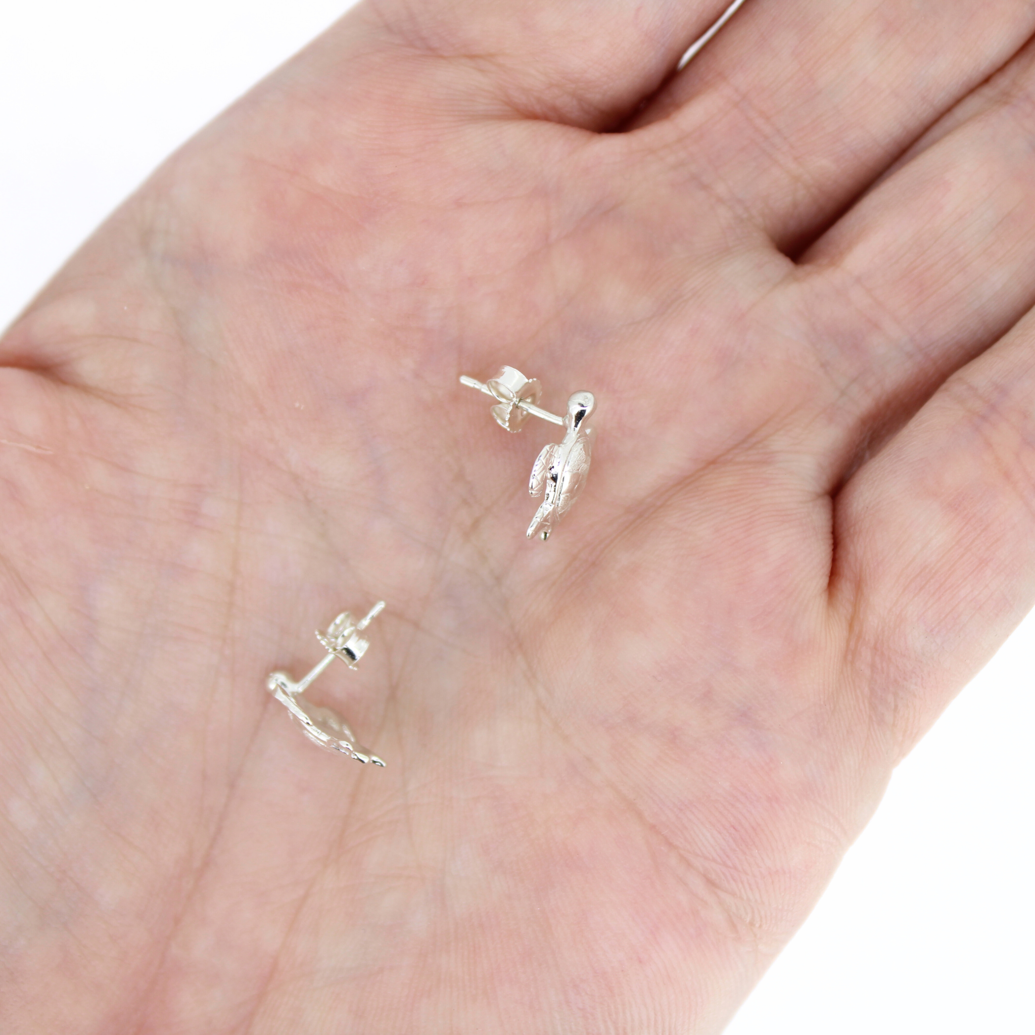 Brianne and Co sterling silver sea turtle earrings, side view showing post and backing