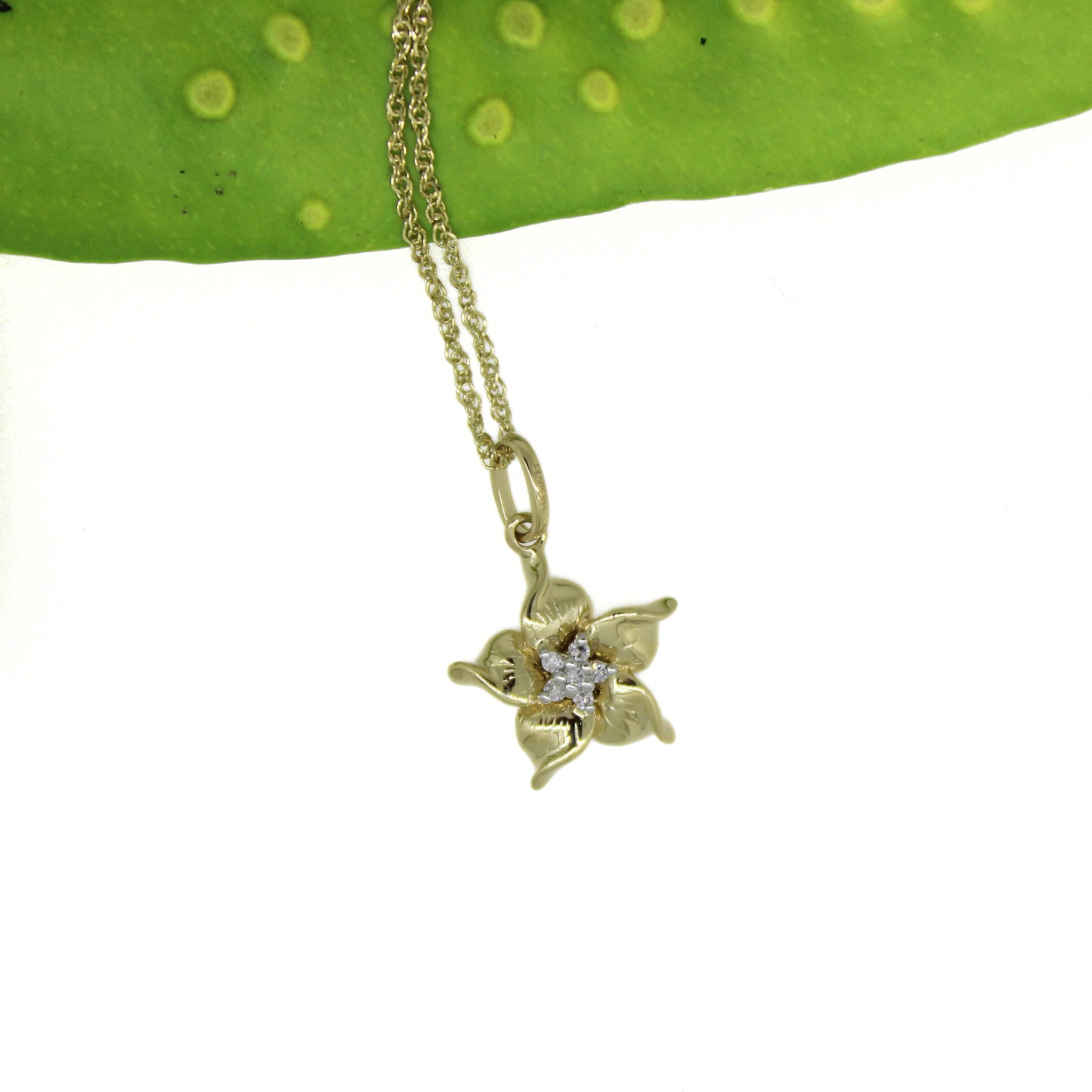 Brianne & Co. 14k gold Hawaiian flower necklace with diamonds in the center