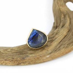 Brianne and Co gold ring with brilliant blue flash labradorite stone