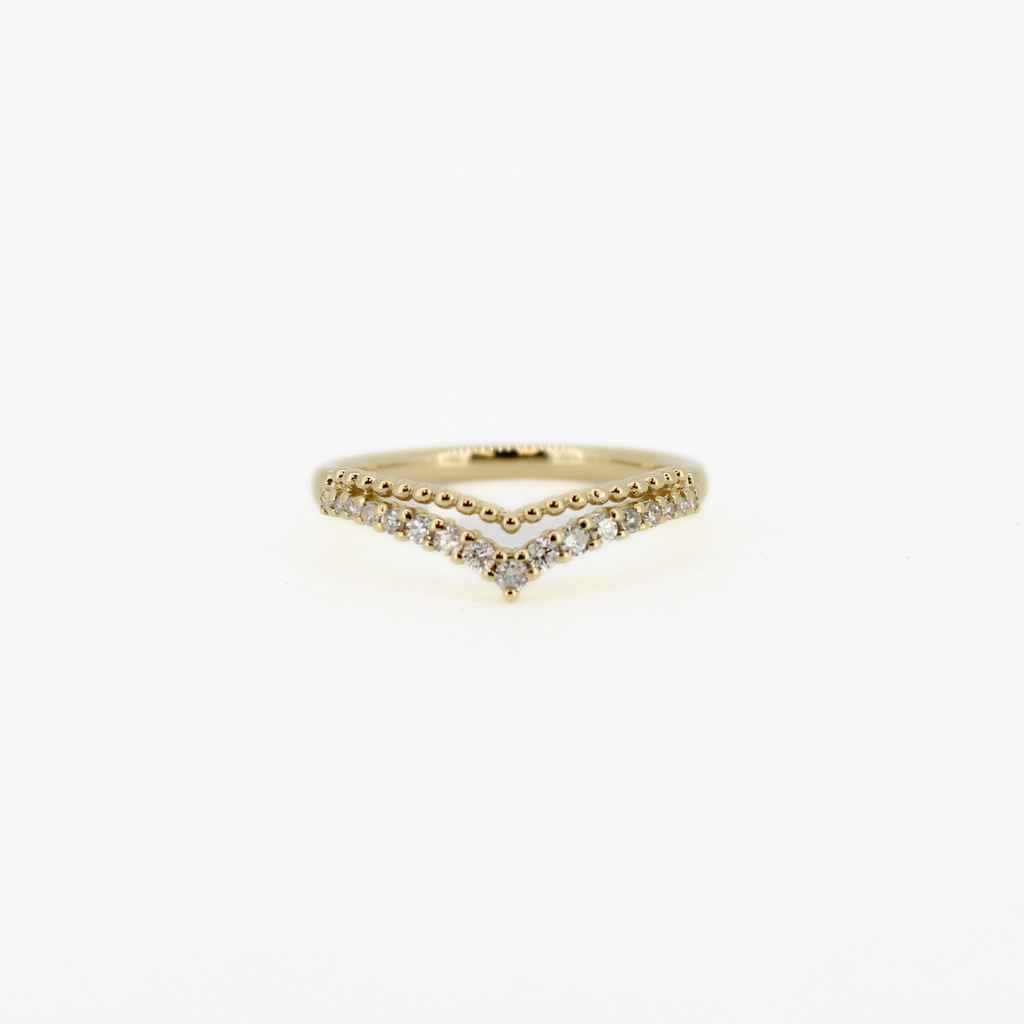 Brianne & Co. 14k gold chevron ring with a beaded design above 17 round diamonds