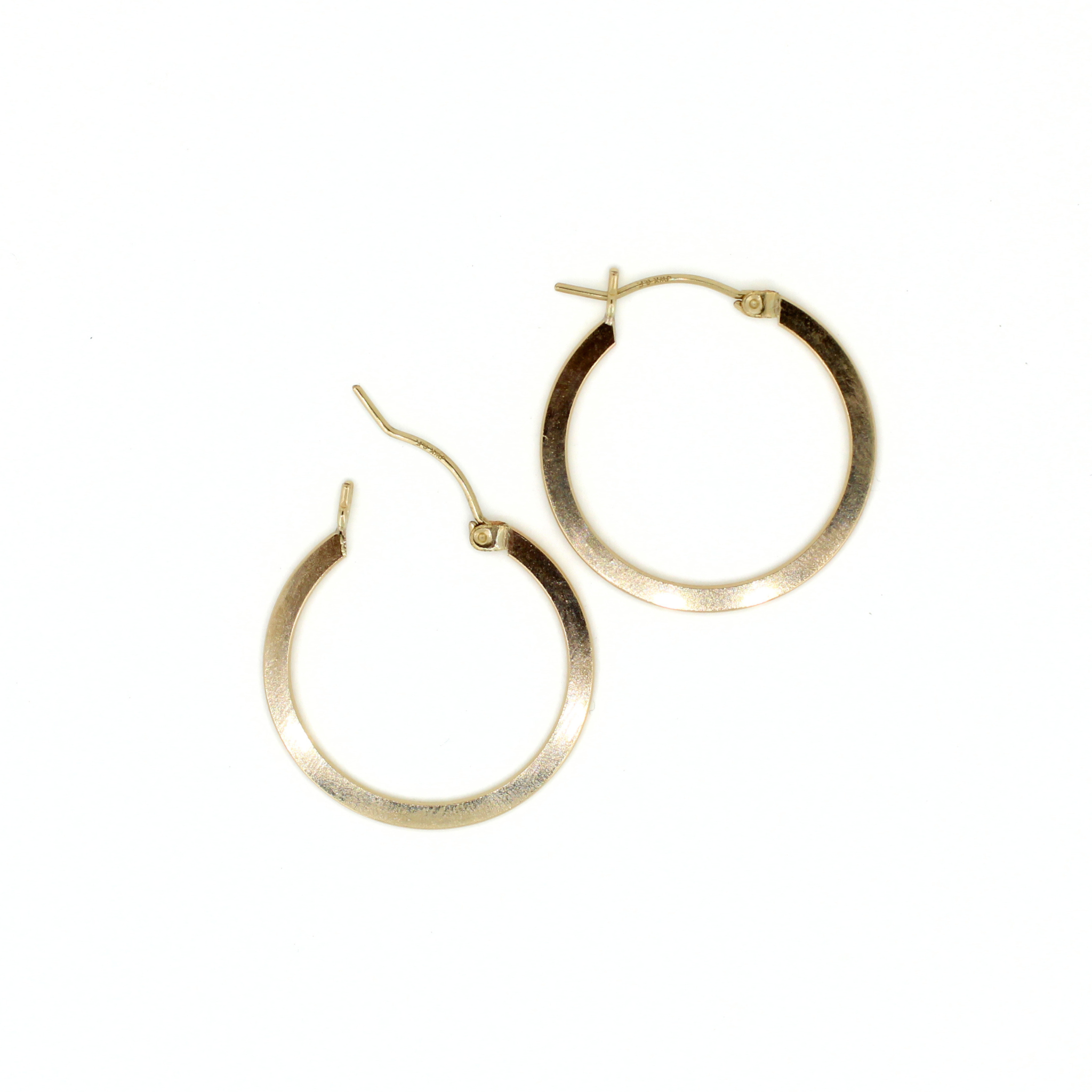 Gold-tone flat hoop earrings, 27mm, pair with hinge and small charm detail