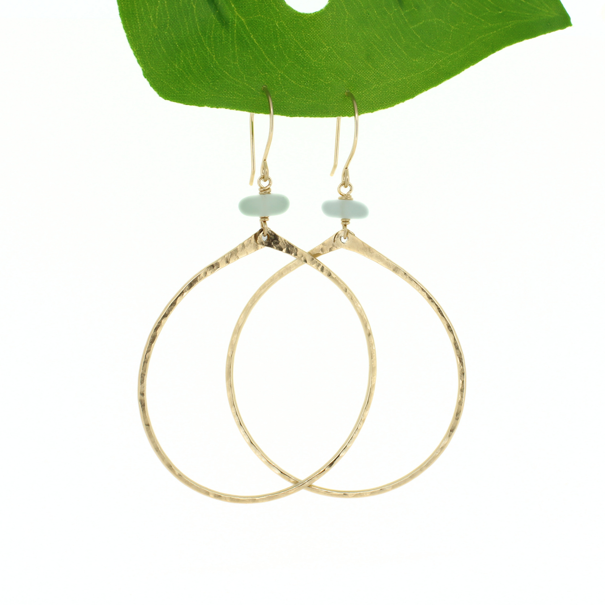 Brianne & Co. 14k gold fill tear drop hoop earrings featuring genuine light blue sea glass