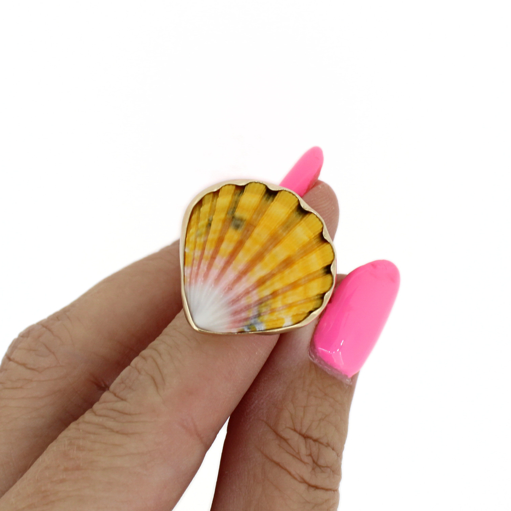 Brianne and Co. holding a Gold Sunrise Shell Ring Size 7