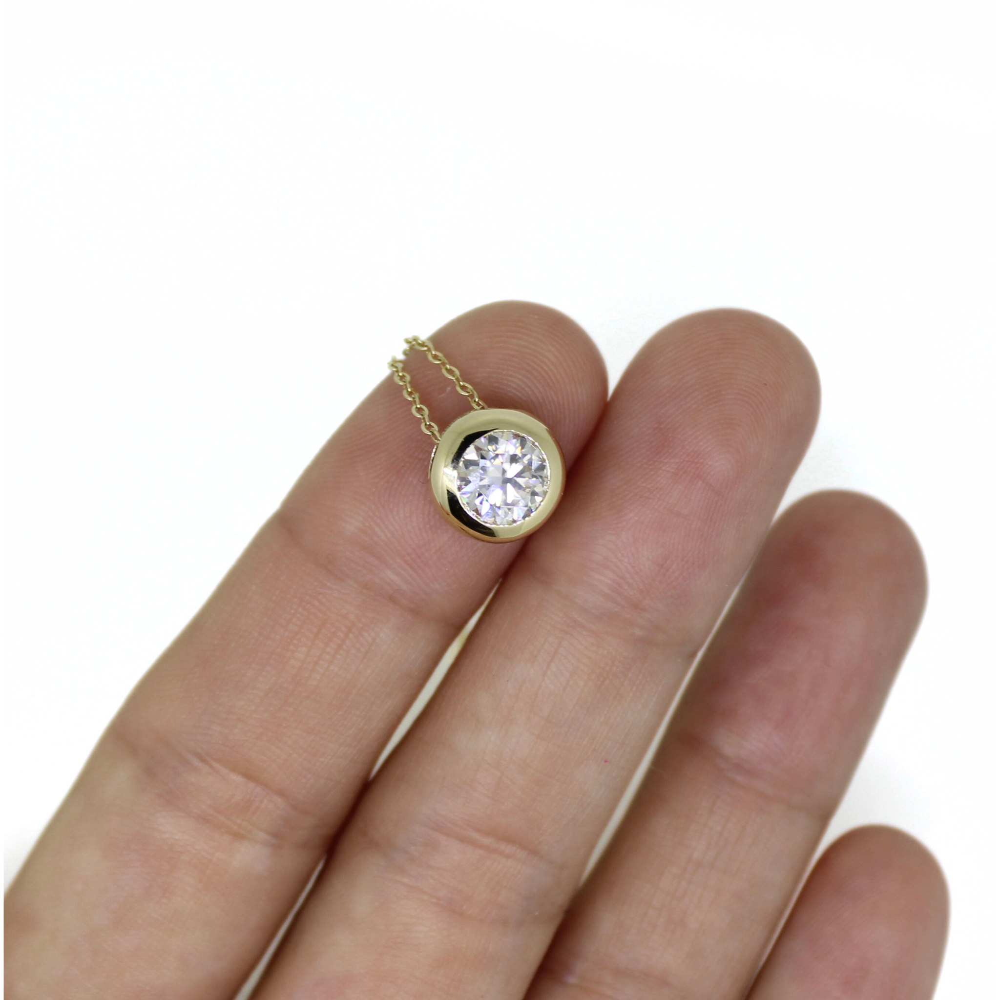 Brianne & Co 1 carat moisante pendant on 14k gold chain