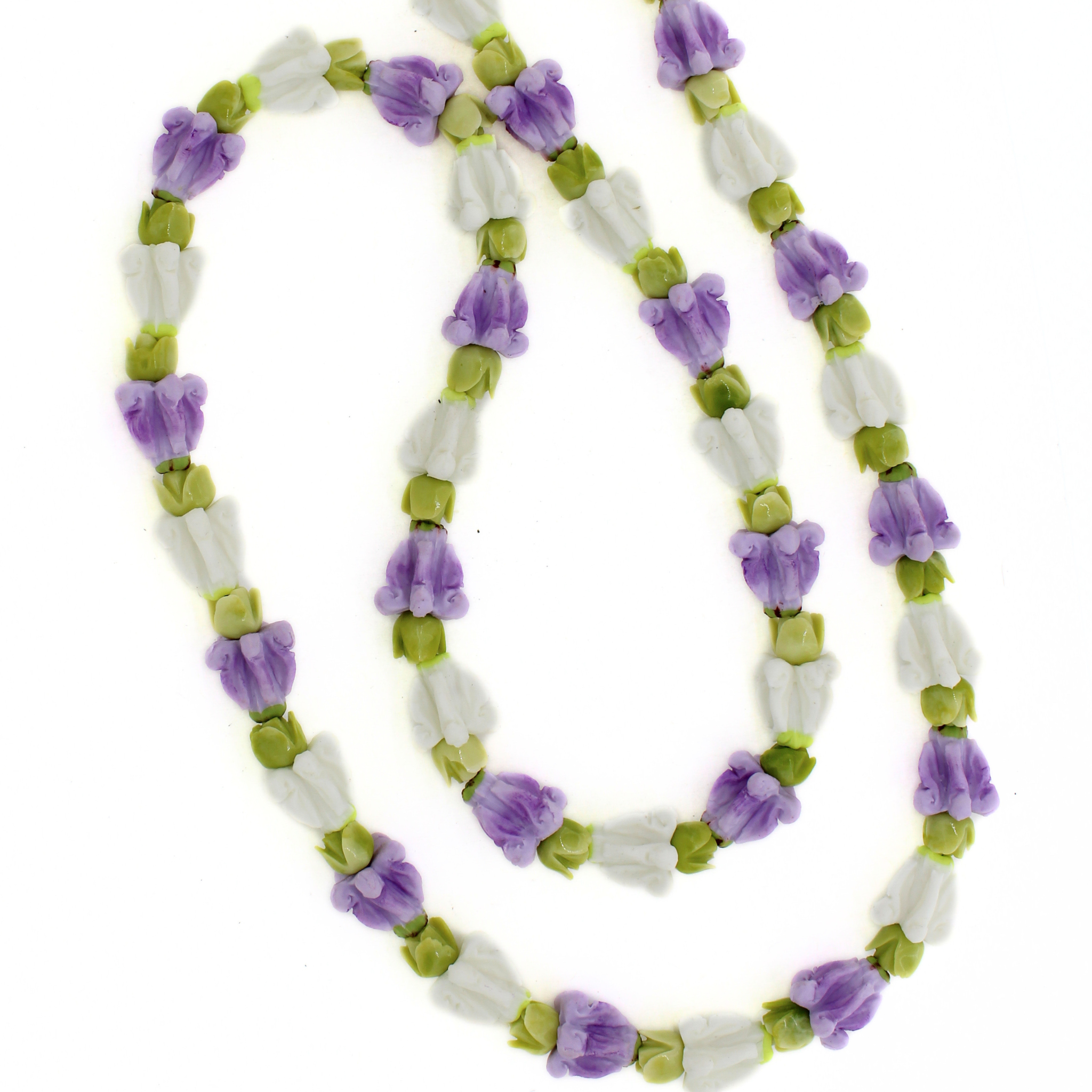 Brianne & Co. long purse lei featuring purple and white crown flowers and green pakalana flowers