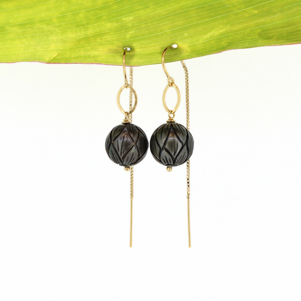 Brianne & Company gold fill threader style earrings featuring two dark grey carved Tahitian pearls