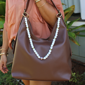 Brown leather handbag with a decorative crown flower purse lei handmade by Brianne & co.