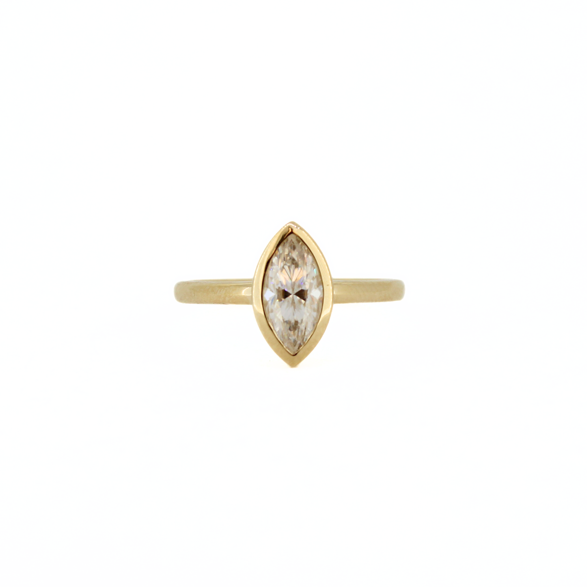 Brianne & Co. 14k gold marquise cut moissanite ring