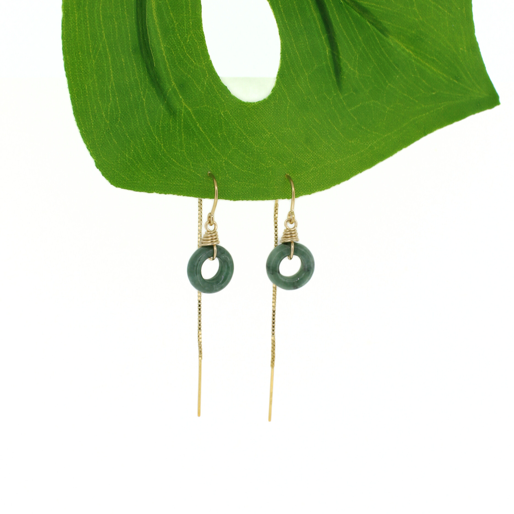 Brianne & Co. 14k gold fill threader style earrings featuring green jade donut shaped gemstones