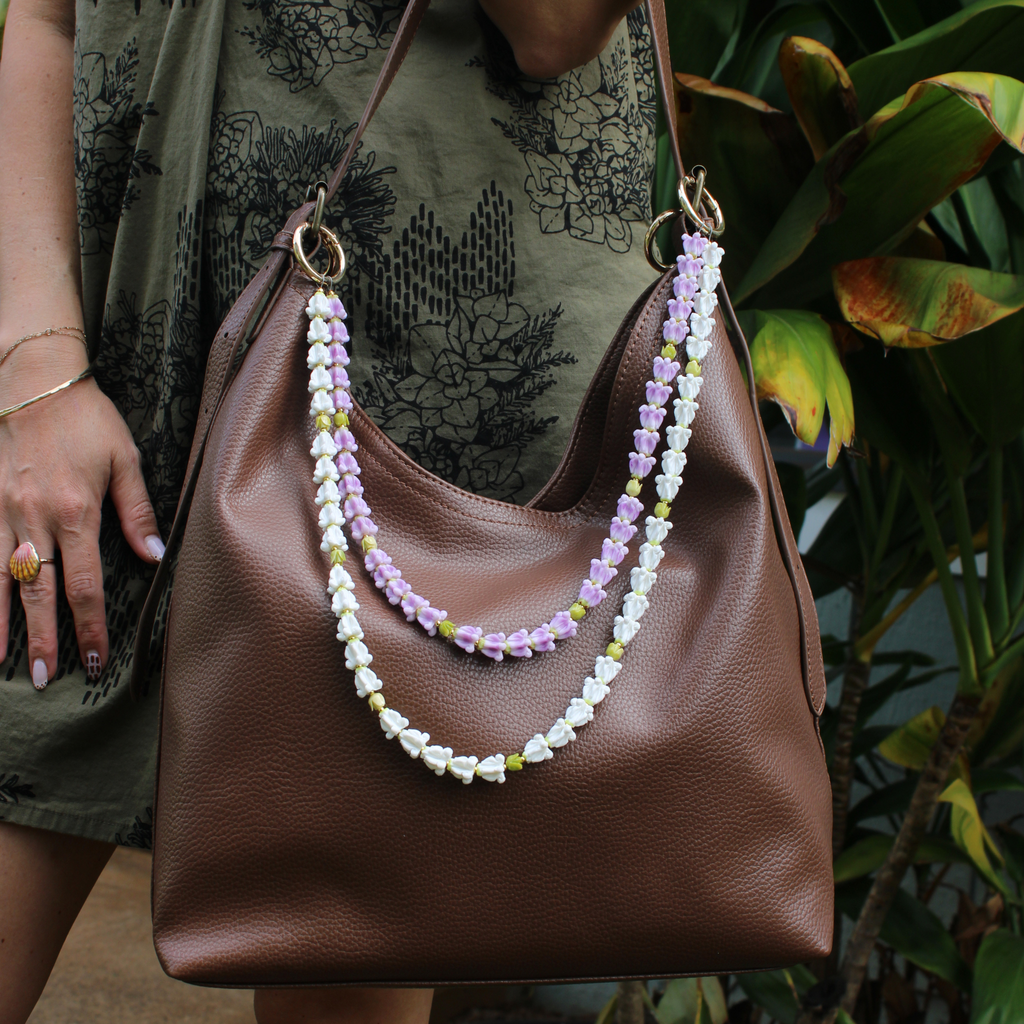 Brianne & Co. purple and white crown flower long double strand purse lei handmade in Kauai, Hawaii