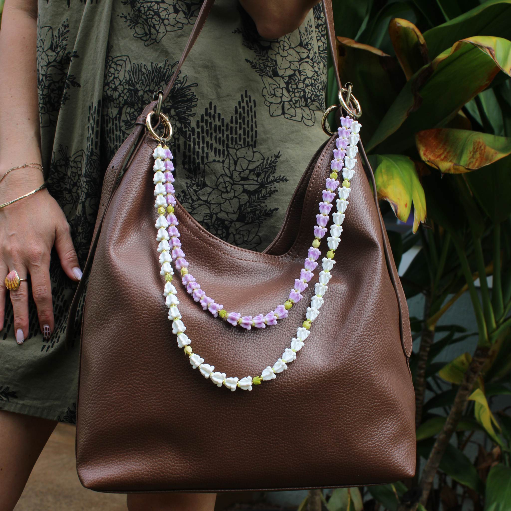 Brianne & Co. purple and white crown flower long double strand purse lei handmade in Kauai, Hawaii