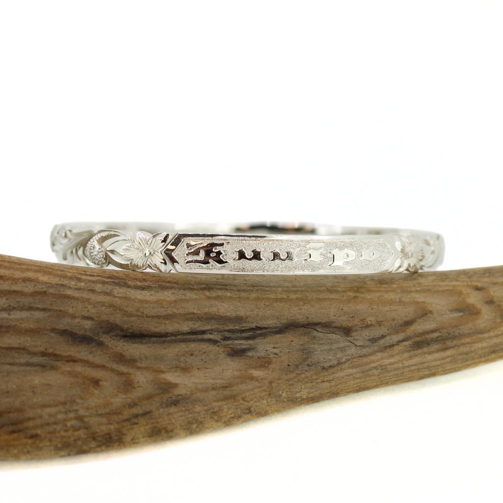 Brianne & Co. sterling silver Hawaiian heirloom bangle with Kuuipo engraved on one side