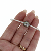 Brianne & Co. sterling silver Tahitian pearl bangle on hand for size reference