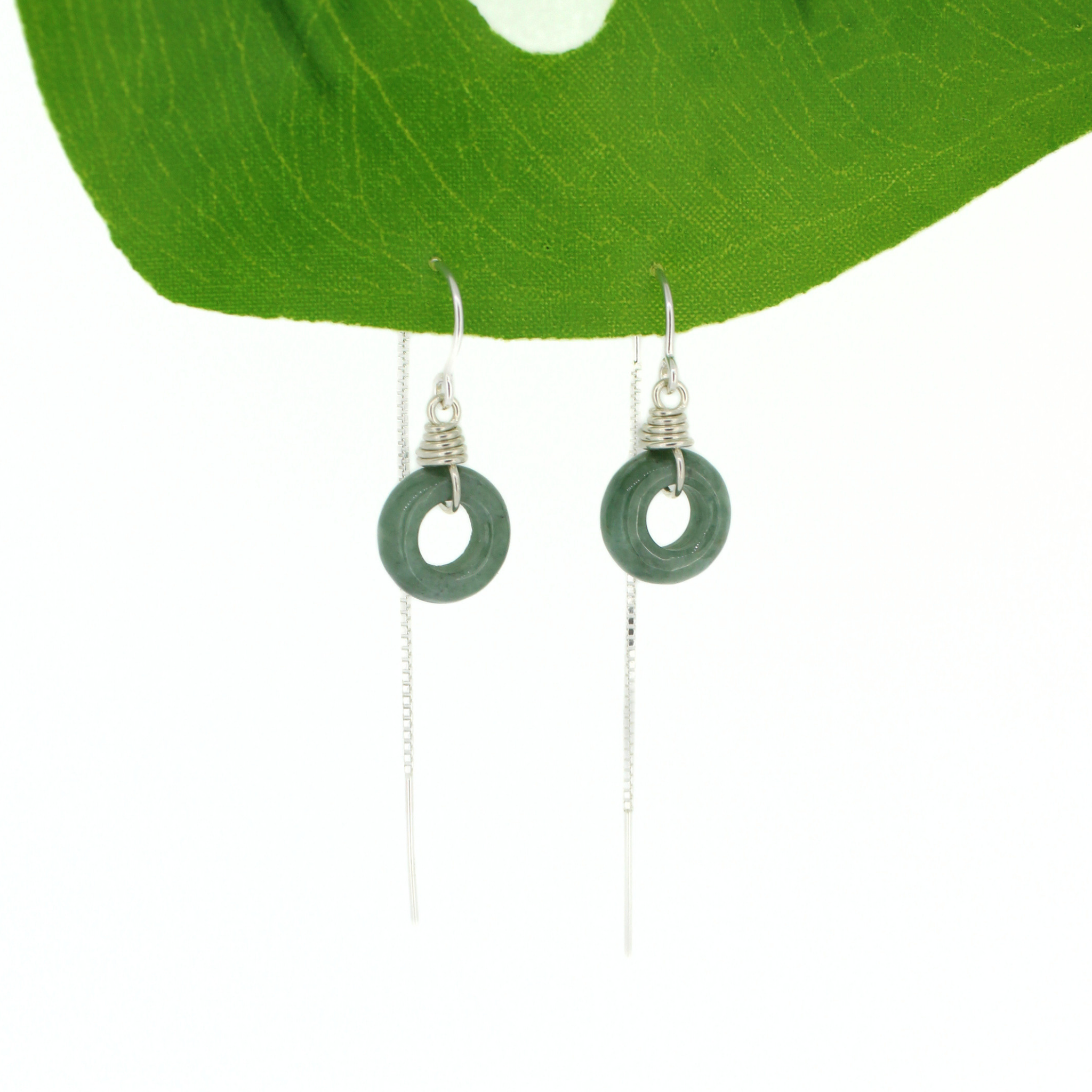 Brianne & Co. sterling silver threader earrings featuring mini green jade donut shaped gemstones