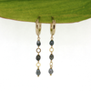 Brianne & Co. gold fill 15mm hoop earrings with little Tahitian keshi pearls front facing view