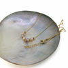 Brianne & Co. gold fill tiny fresh water pearl necklace featuring 5 pearls with gold beads between each pearl