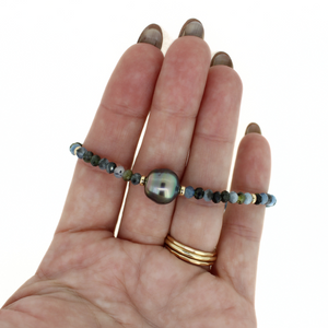 Brianne & Co. gold fill aquamarine and Tahitian pearl bracelet on hand for size reference