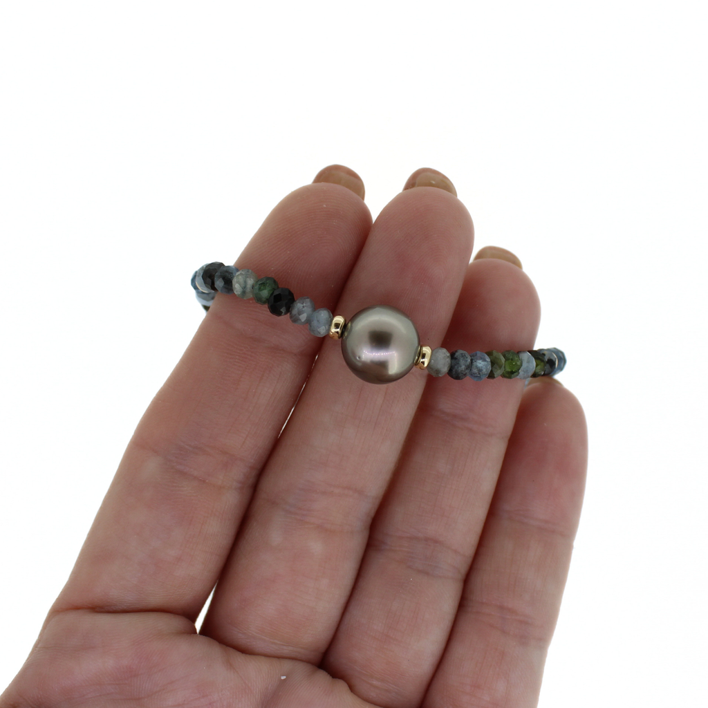 Brianne & Co. gold fill aquamarine and Tahitian pearl bracelet on hand for size reference