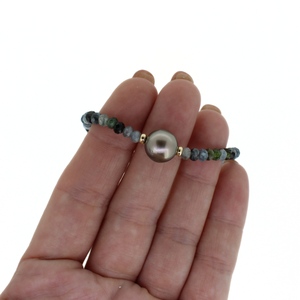 Brianne & Co. gold fill aquamarine and Tahitian pearl bracelet on hand for size reference