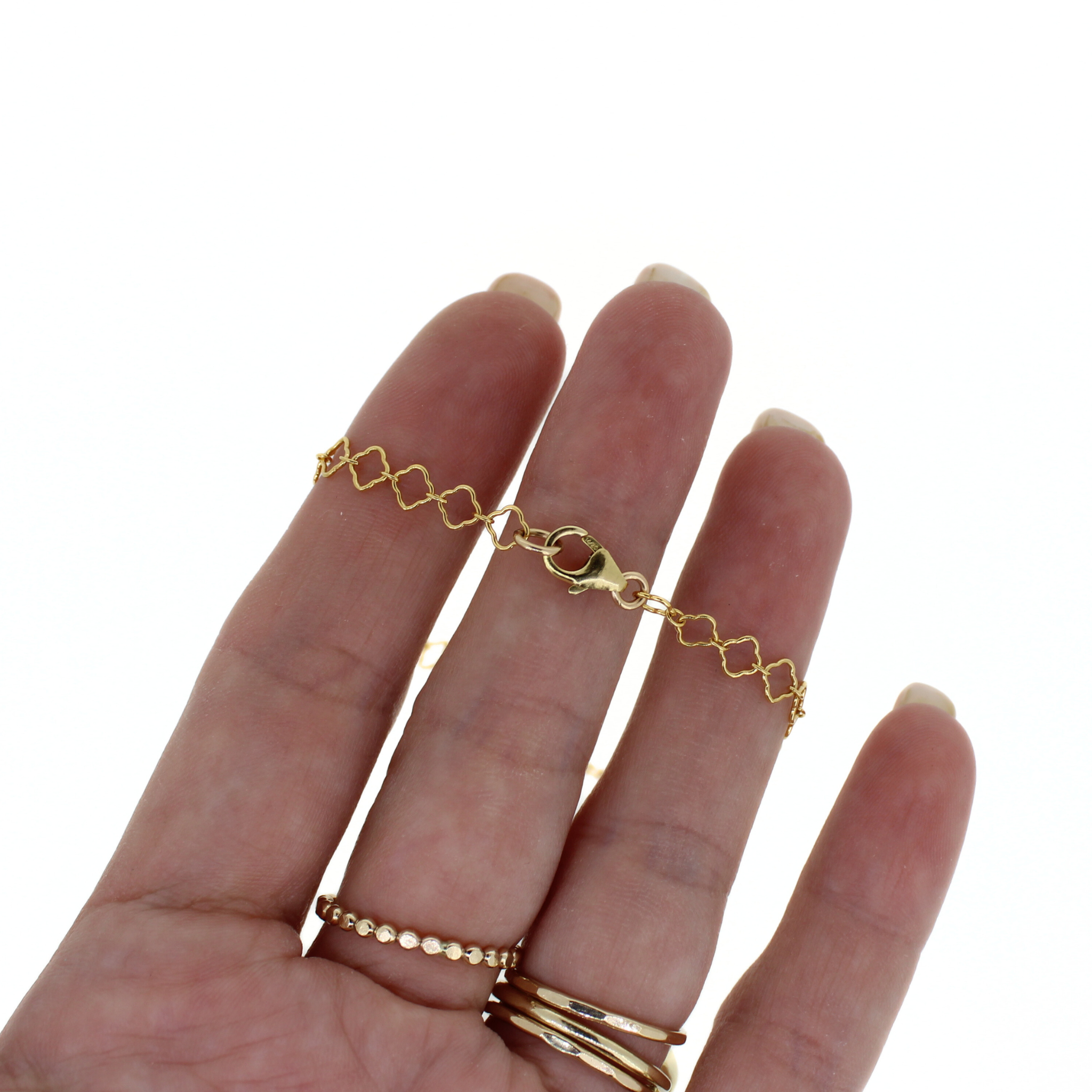 Brianne & Co. gold fill clover chain bracelet close p view of lobster clasp