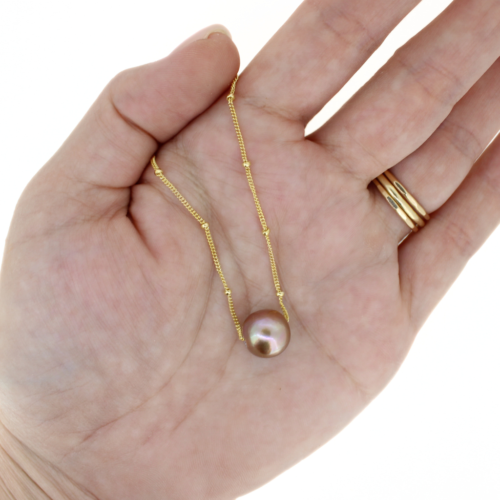 Brianne & Co. gold fill floating Edison pearl necklace on hand for size reference