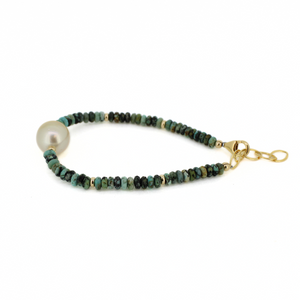 Brianne & Co gold fill African turquoise and golden south sea pearl bracelet side view