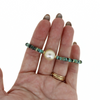 Brianne & Co gold fill African turquoise and golden south sea pearl bracelet on hand for size reference