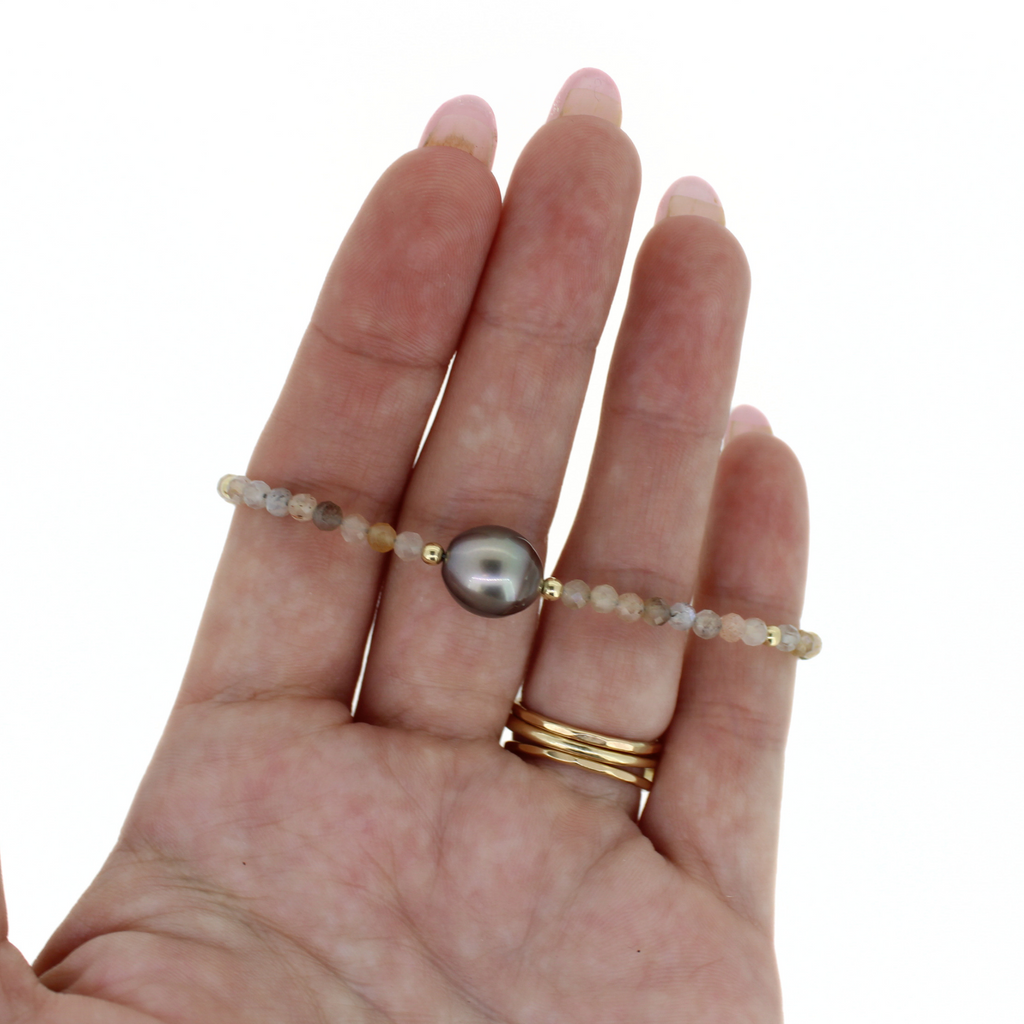 Brianne & Co. gold fill grey moonstone and Tahitian pearl bracelet on hand