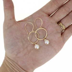Brianne & Co. gold fill fresh water pearl hoop earrings on hand for size reference